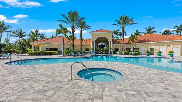 a view of a swimming pool with a patio
