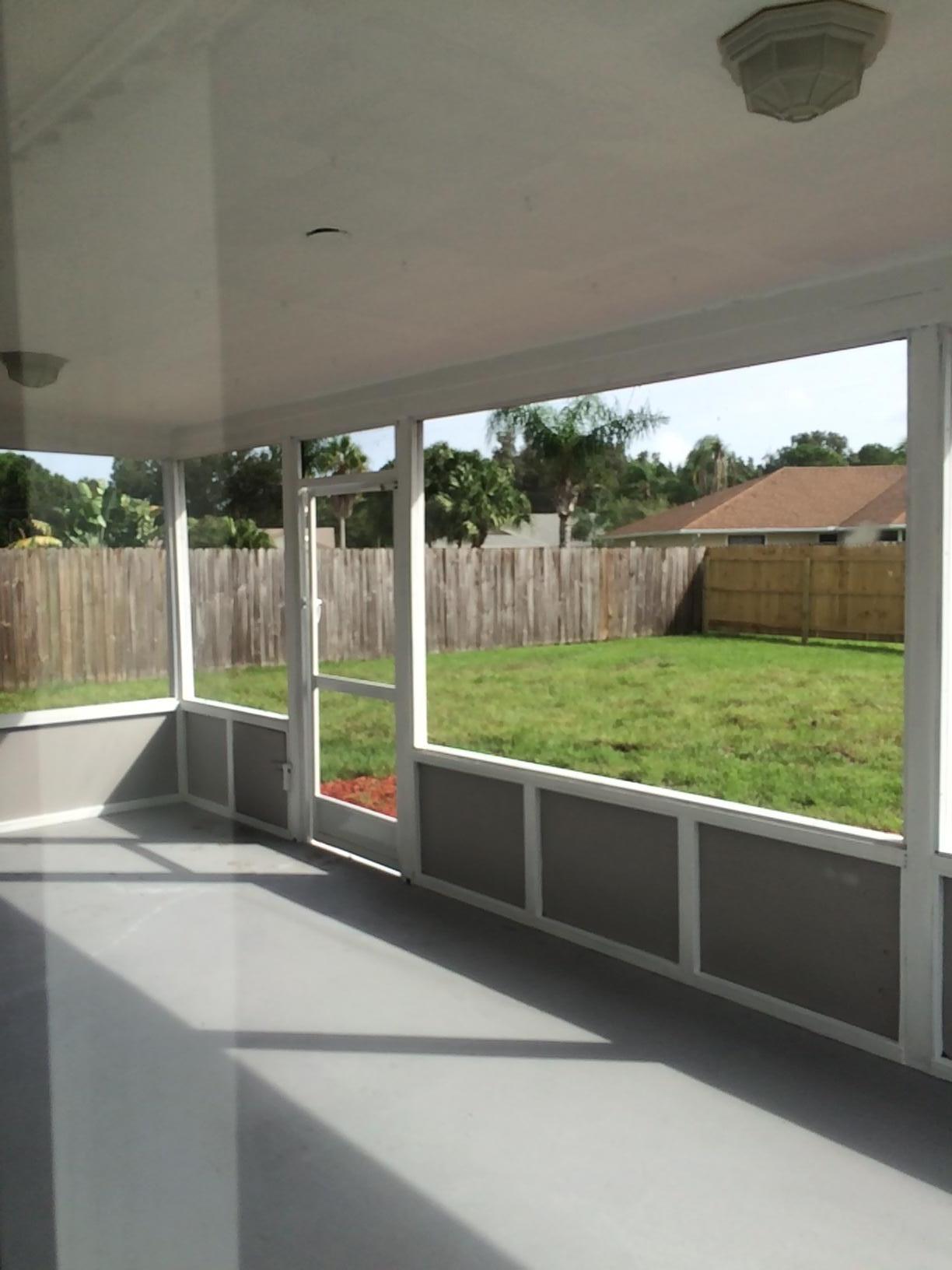 6667 Southeast Raintree Avenue Stuart, FL 34997 - Photo 20 of 22 BACK PORCH 1