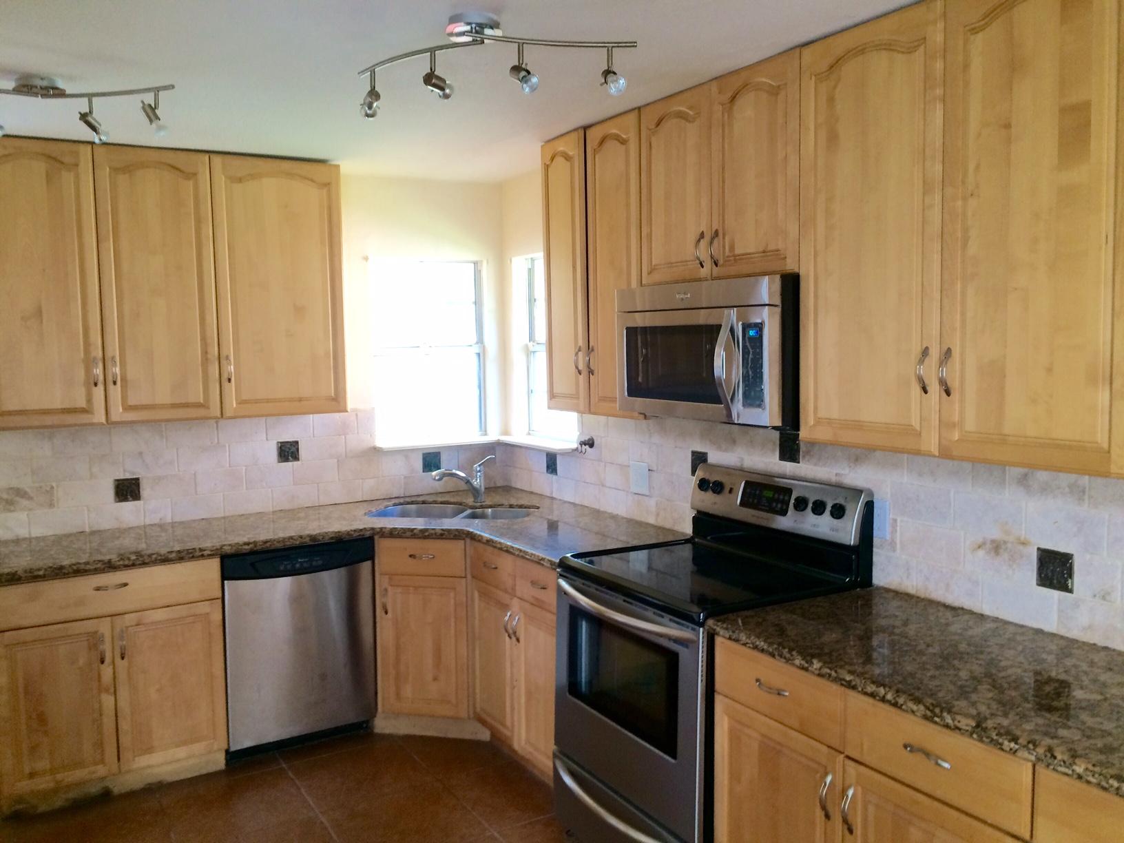 6667 Southeast Raintree Avenue Stuart, FL 34997 - Photo 4 of 22 KITCHEN 1