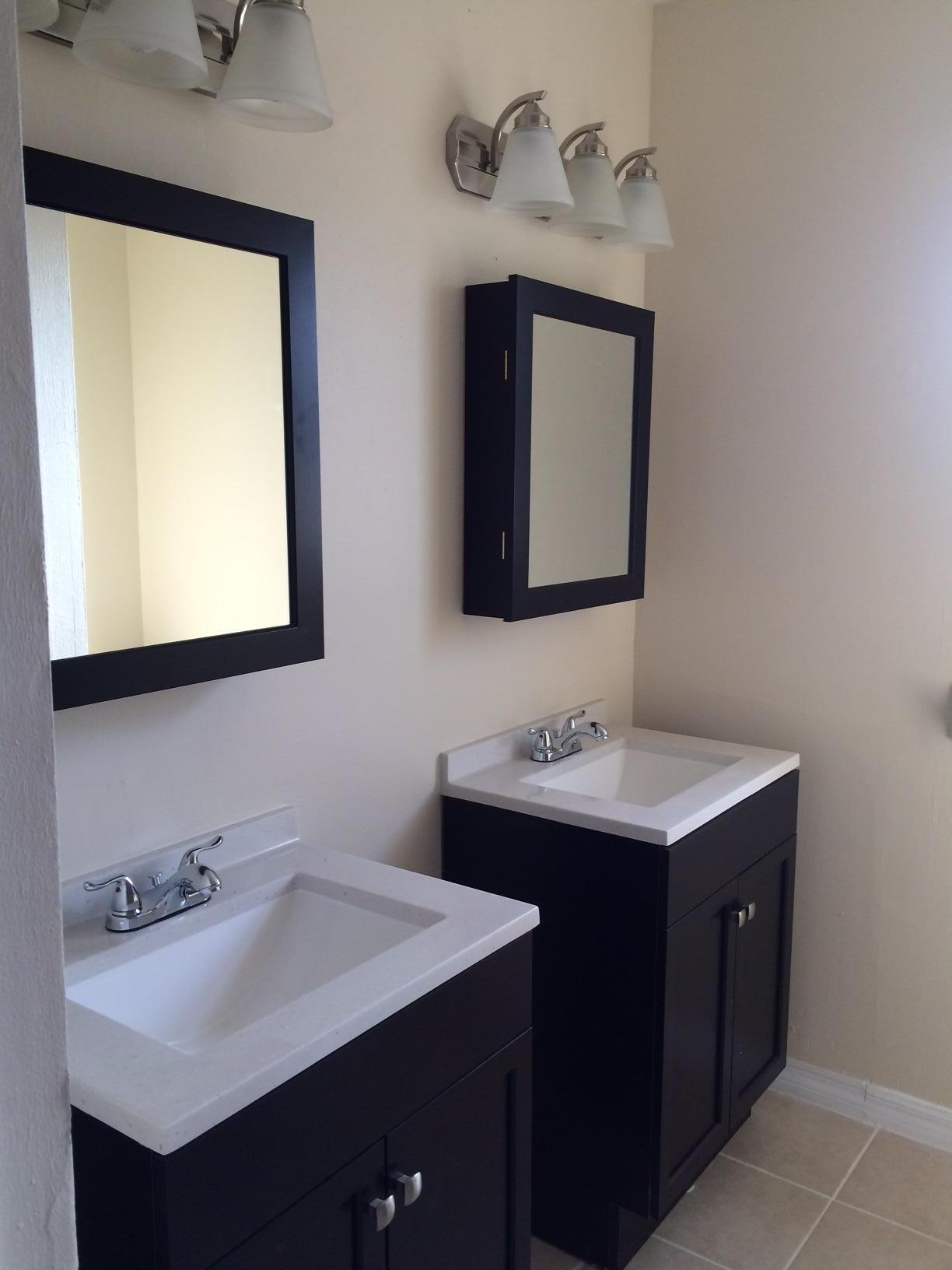 6667 Southeast Raintree Avenue Stuart, FL 34997 - Photo 8 of 22 UPSTAIRS BATHROOM 1