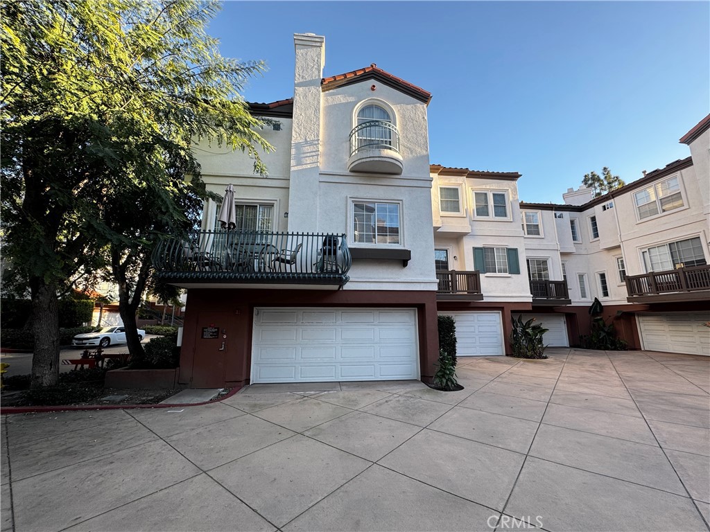 2920 Player Tustin, CA 92782 - Photo 2 of 2 a view of a street with sitting area