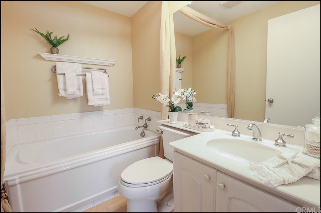 16 Pineoak Aliso Viejo, CA 92656 - Photo 16 of 24 a bathroom with a sink and a mirror