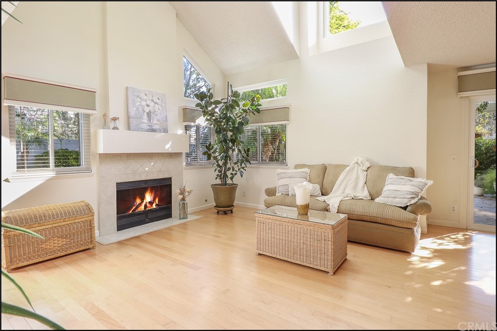 16 Pineoak Aliso Viejo, CA 92656 - Photo 3 of 24 a living room with furniture and a fireplace