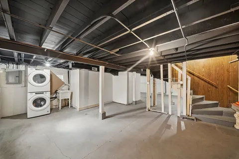 a view of an empty room with windows