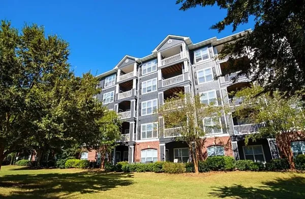 front view of a building with a yard