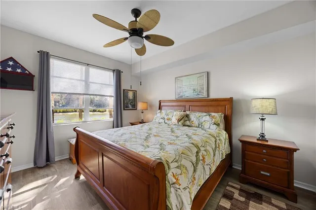 a bed room with a bed and a window