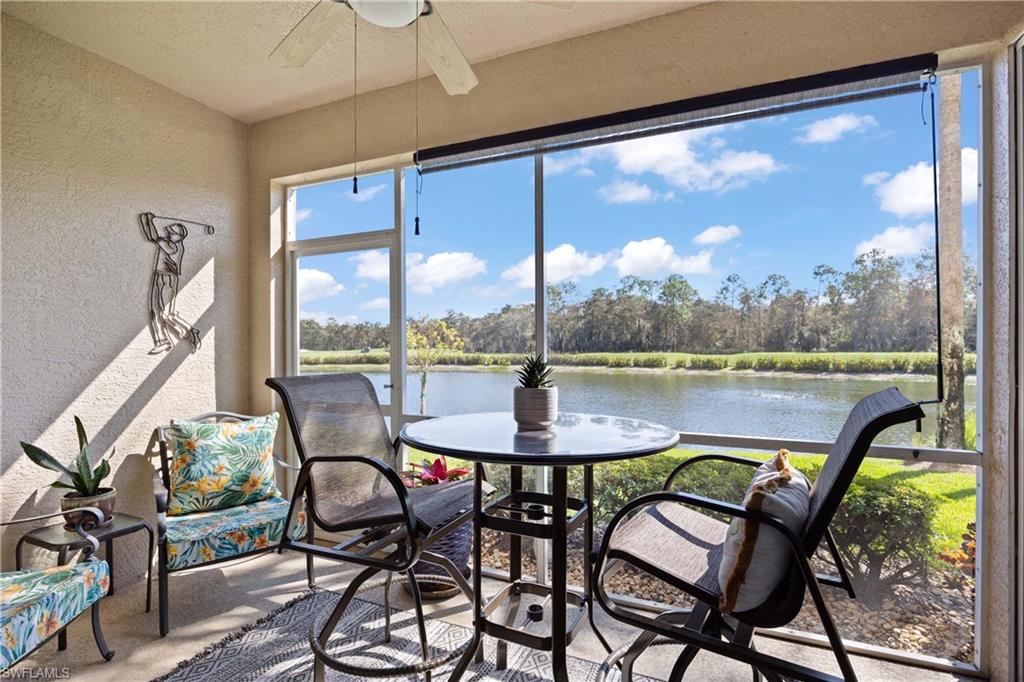3760 Sawgrass Way, Unit 3514 Naples, FL 34112 - Photo 21 of 43 a view of a dining room with furniture window and outside view
