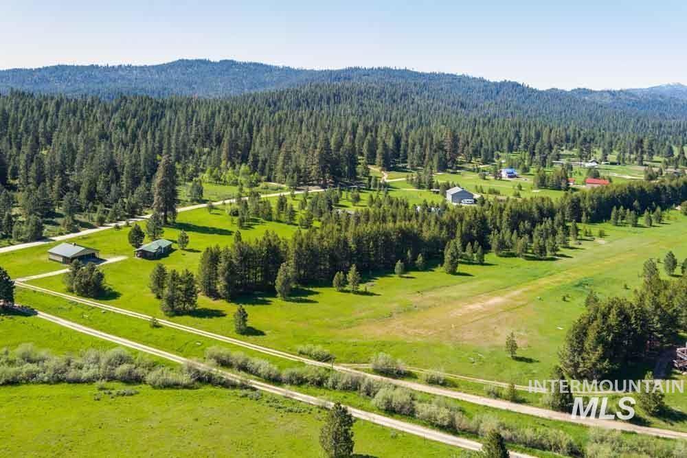 678 High Valley Road Cascade, ID 83611 - Photo 16 of 16 Overview of rural landscape with a heavily wooded area and a mountainous background