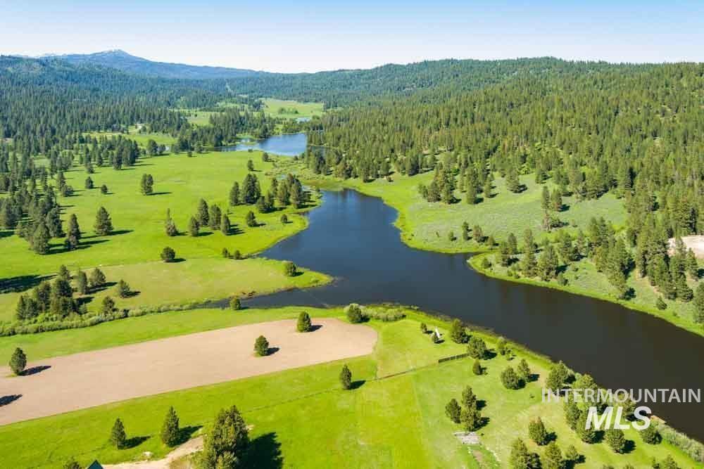 678 High Valley Road Cascade, ID 83611 - Photo 6 of 16 Aerial view of a forest and a large body of water