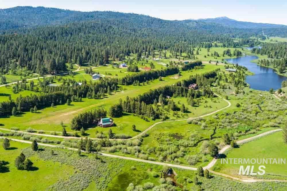 678 High Valley Road Cascade, ID 83611 - Photo 8 of 16 Drone / aerial view of a forest and mountains