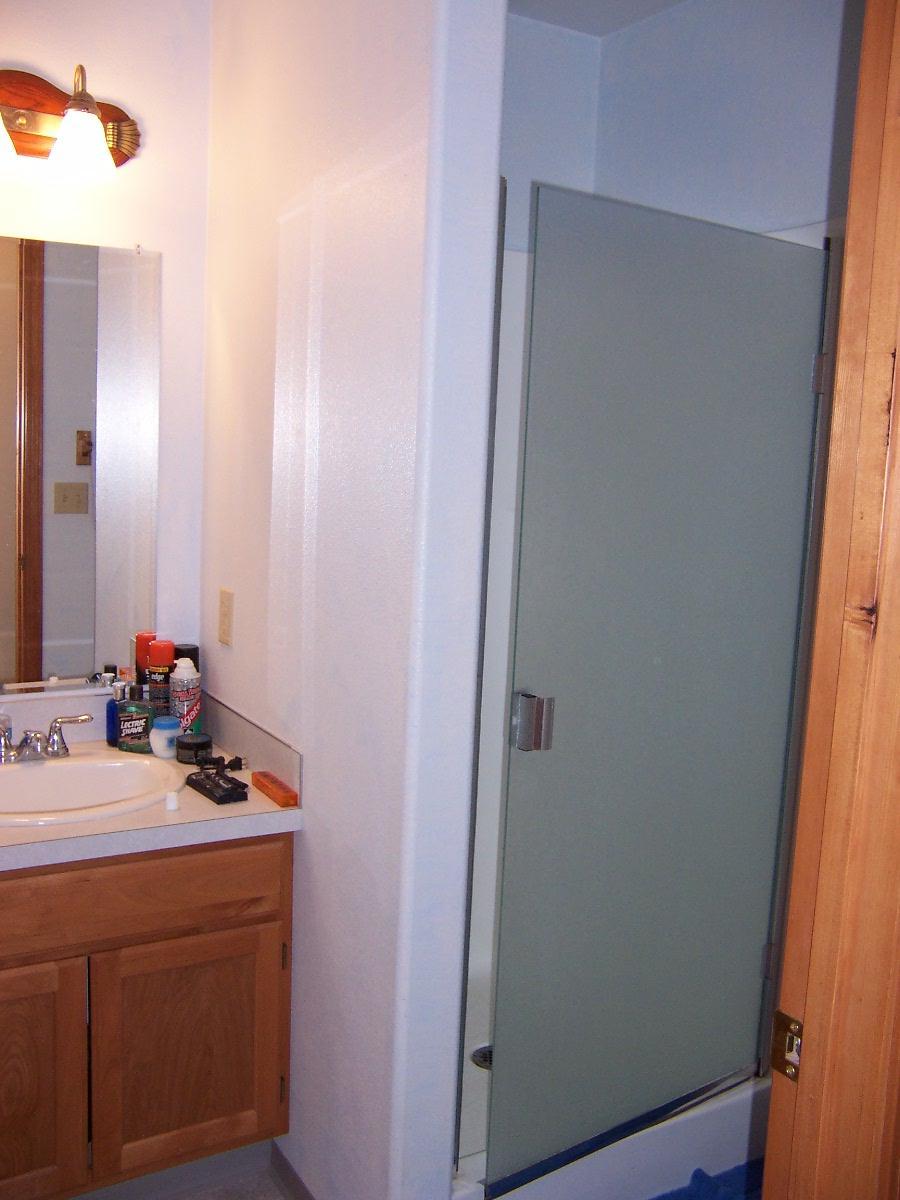 501 Sharp Road Tieton, WA 98947 - Photo 10 of 13 a bathroom with a sink a mirror and vanity