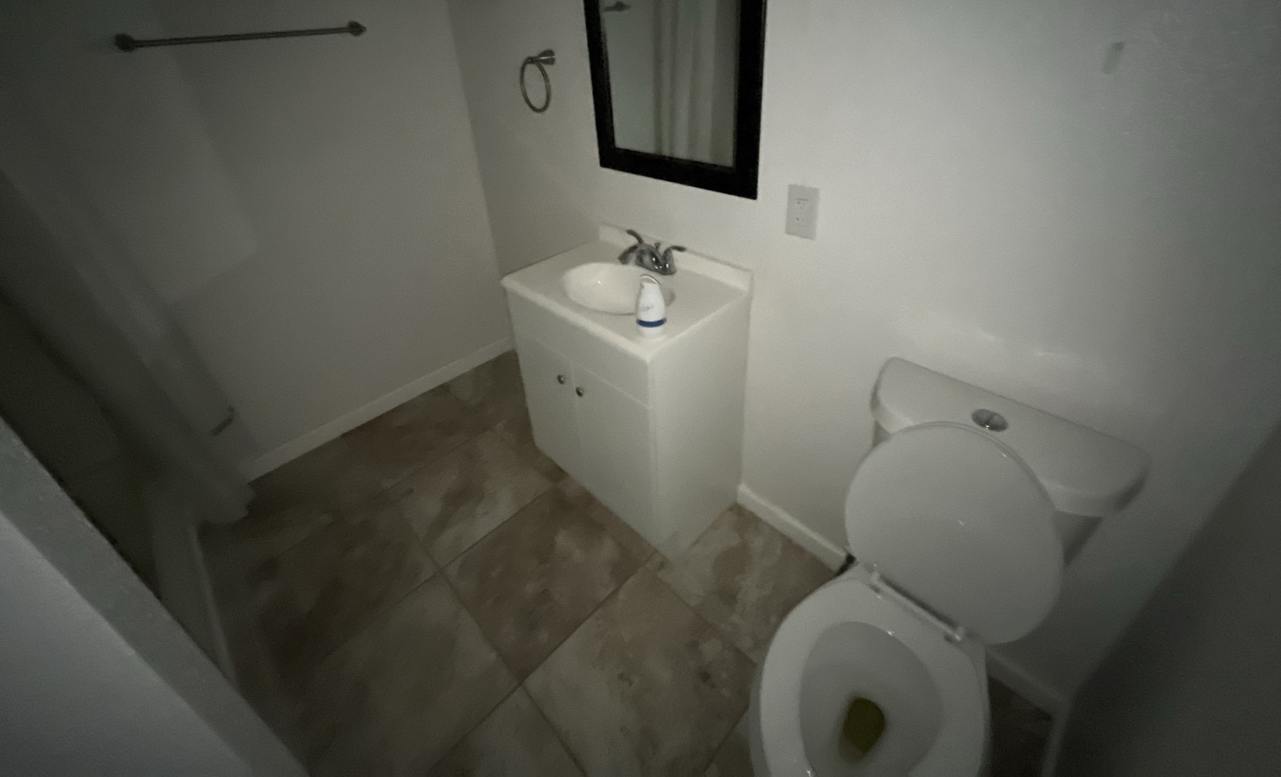 524 Rangeland Road Blanco, TX 78606 - Photo 17 of 23 Functional bathroom featuring a vanity sink and toilet, designed for everyday convenience.
