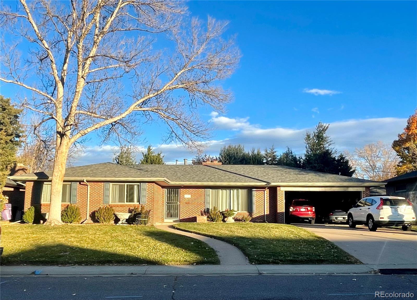 3022 South Gilpin Street Denver, CO 80210 - Photo 1 of 28 a view of a house with outdoor space and sitting area