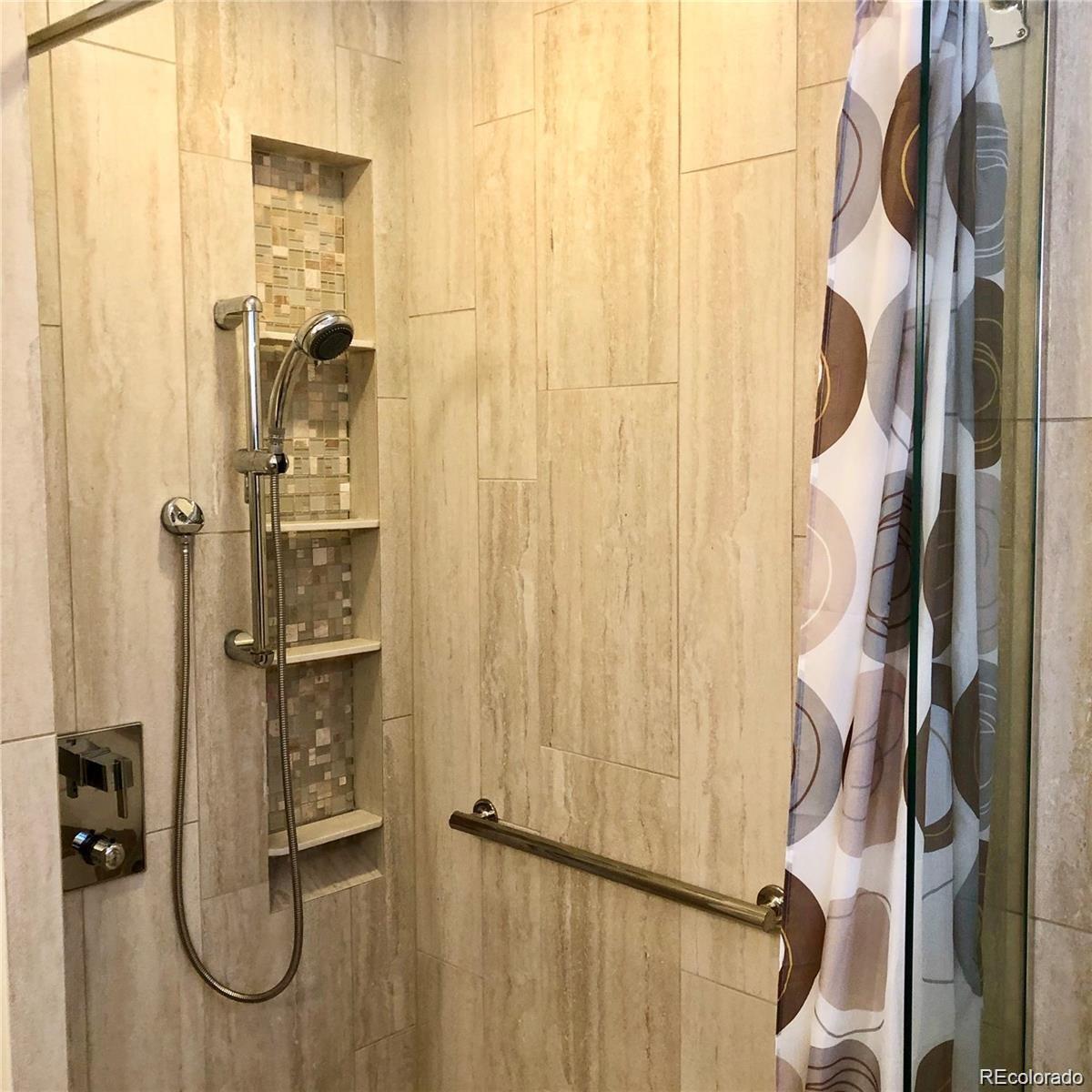 3022 South Gilpin Street Denver, CO 80210 - Photo 25 of 28 a bathroom with a granite countertop shower and a mirror