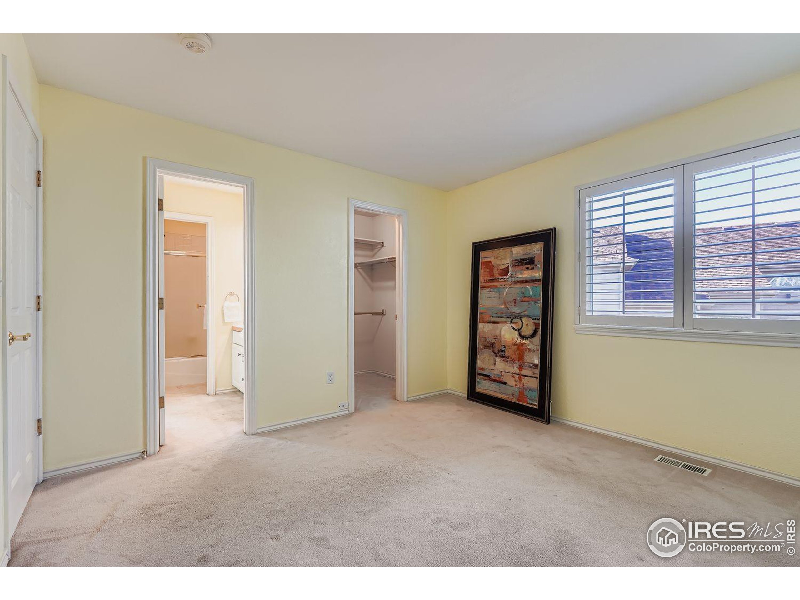 569 Flying Jib Court Lafayette, CO 80026 - Photo 22 of 31 a view of an empty room with a window