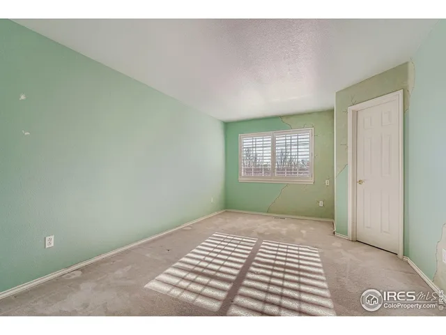 a bathroom with a sink double vanity and a mirror