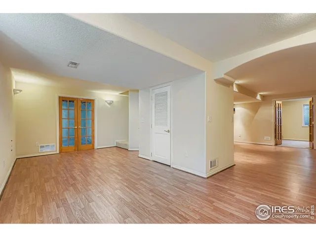 a view of a backyard with furniture