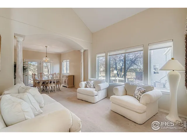 a dining room with furniture window wooden floor