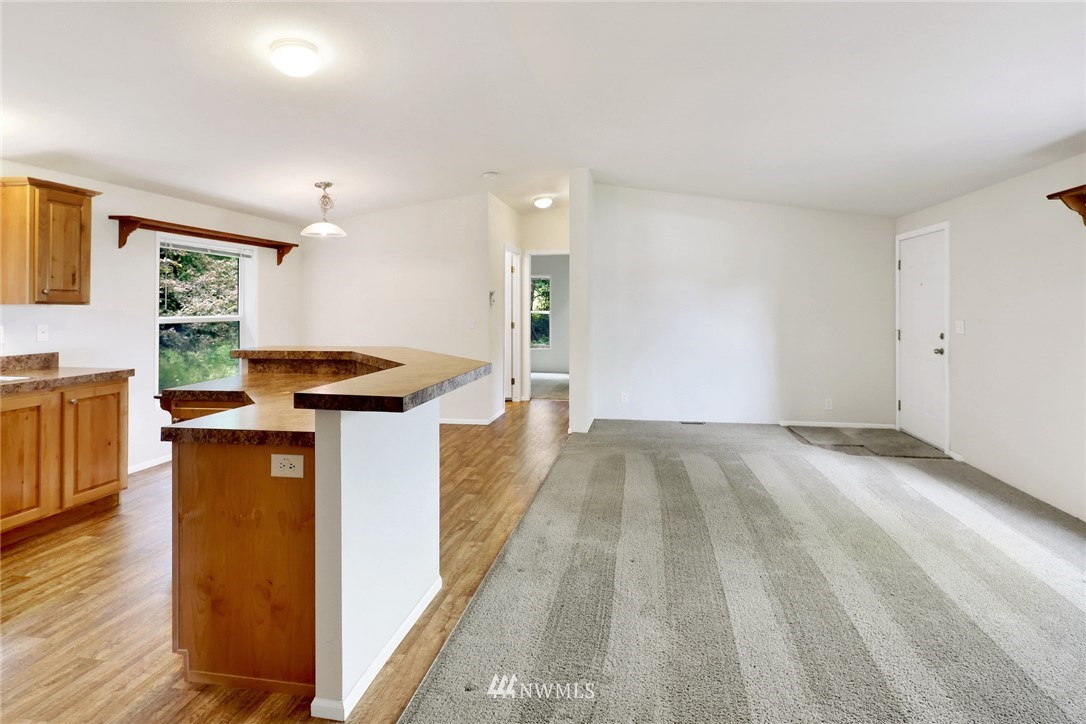 6752 Goodwin Road Everson, WA 98247 - Photo 13 of 28 a view of a kitchen from the hallway