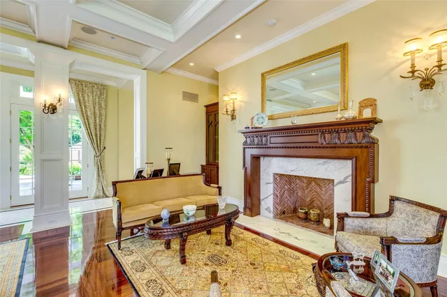 a bath room with a chandelier and a bath tub