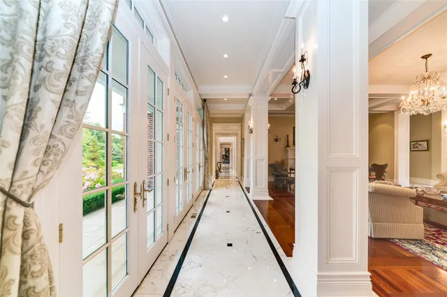 a bathroom with a sink shower and a mirror