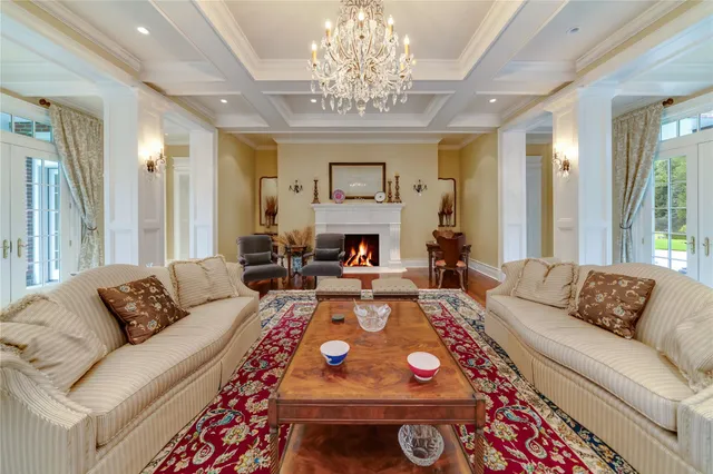 a kitchen with kitchen island a stove a sink and a refrigerator