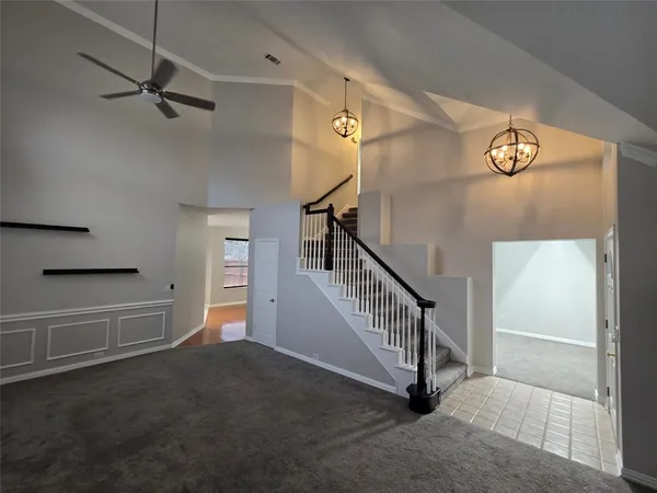 a view of a hallway with staircase