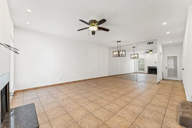 a view of a kitchen with a sink and a refrigerator cabinets