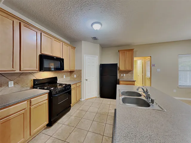 $1,980 | 9215 Birch Springs Drive, Houston, TX 77095