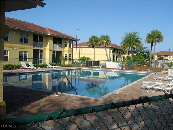 a view of a house with swimming pool