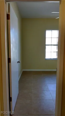 a view of a room that has a window in it