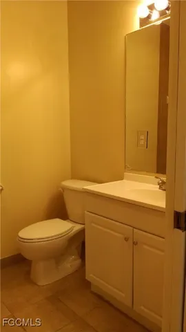 a bathroom with a toilet and a sink
