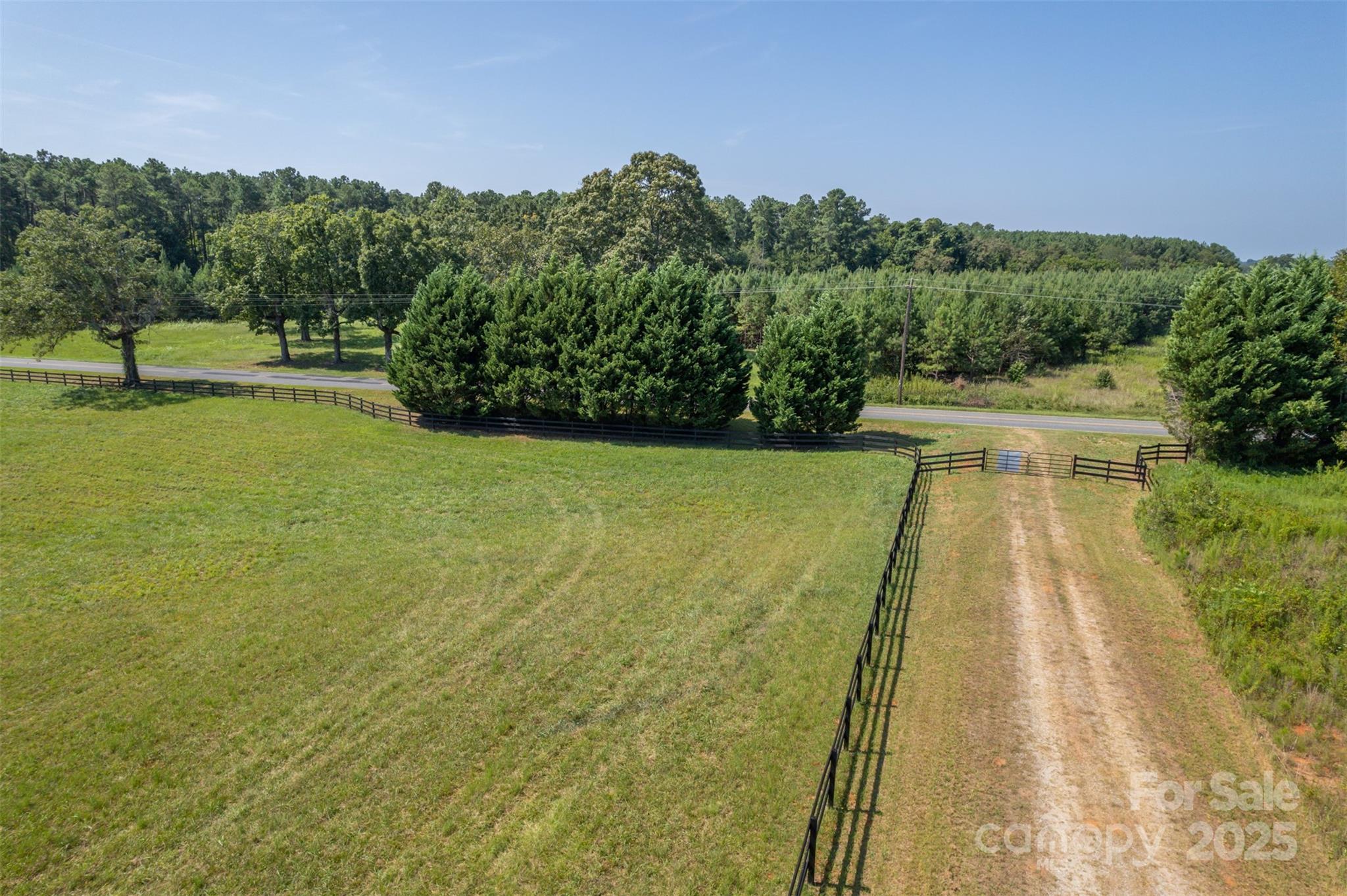 0 Hudson Drive, Unit 55 Rutherfordton, NC 28139 - Photo 7 of 9 a view of swimming pool with seating area and trees in the background