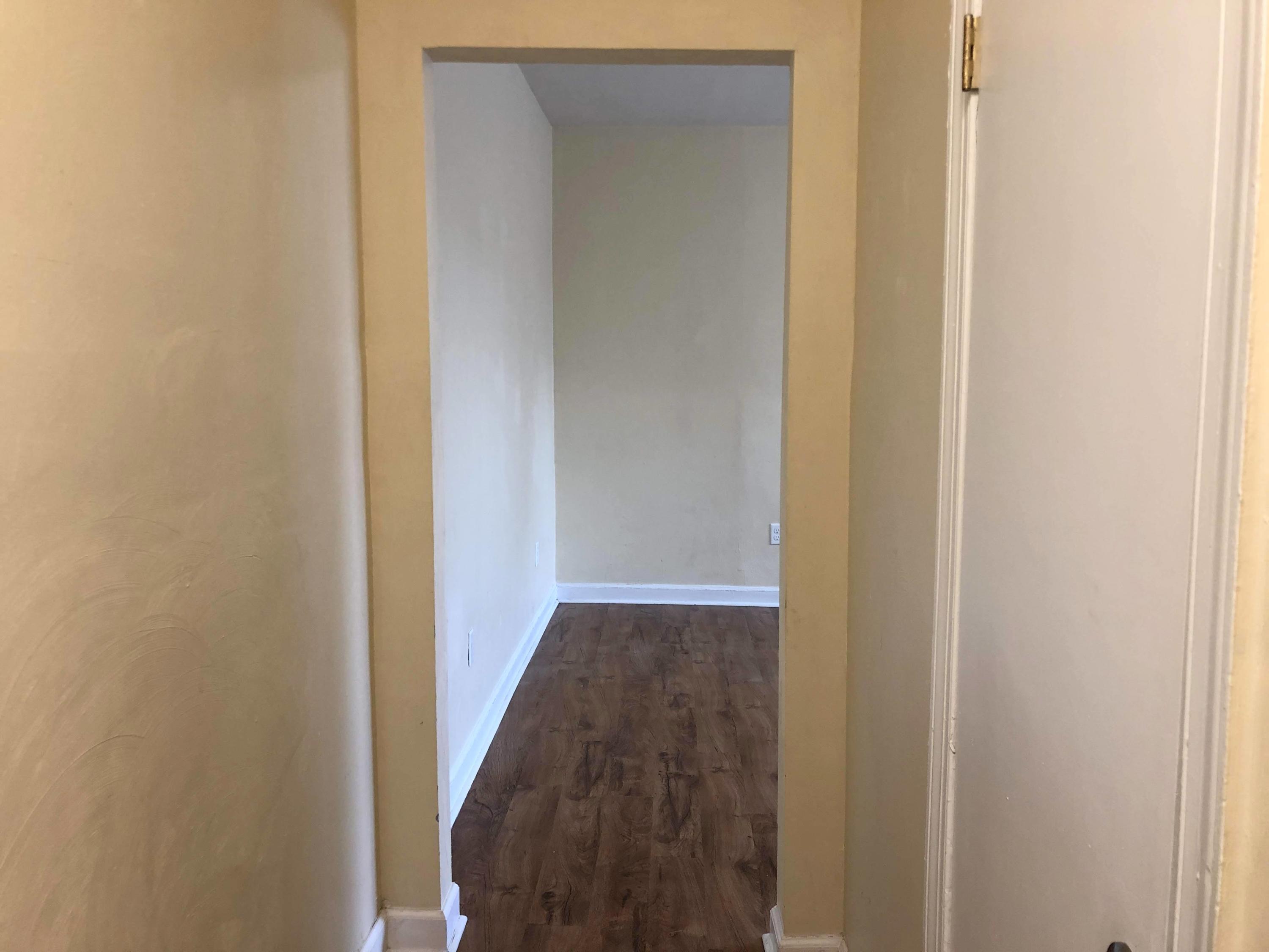 202 Elm Avenue, Unit A8 Roanoke, VA 24016 - Photo 14 of 23 a view of a hallway with wooden floor