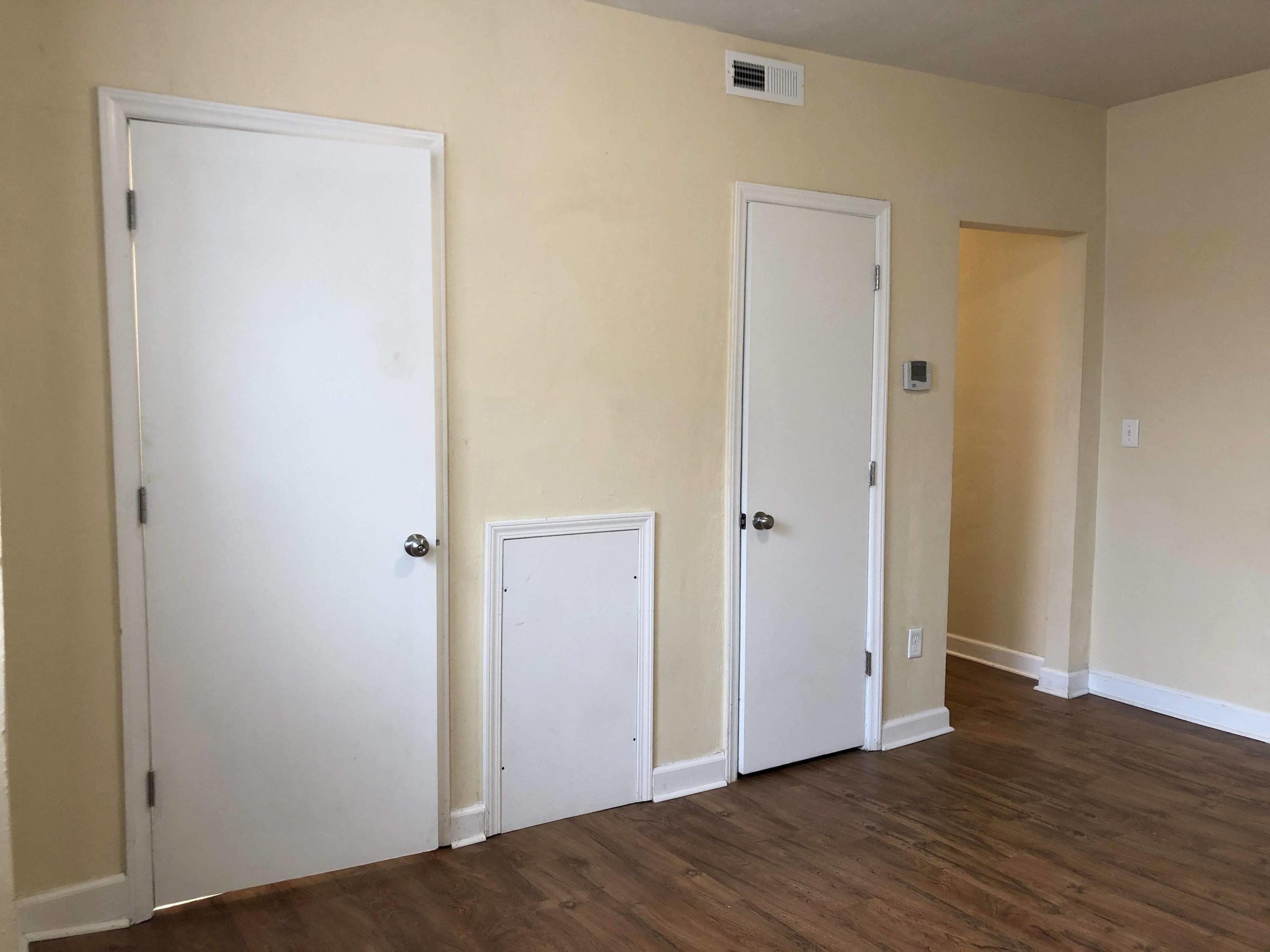 202 Elm Avenue, Unit A8 Roanoke, VA 24016 - Photo 20 of 23 a view of an empty room with wooden floor