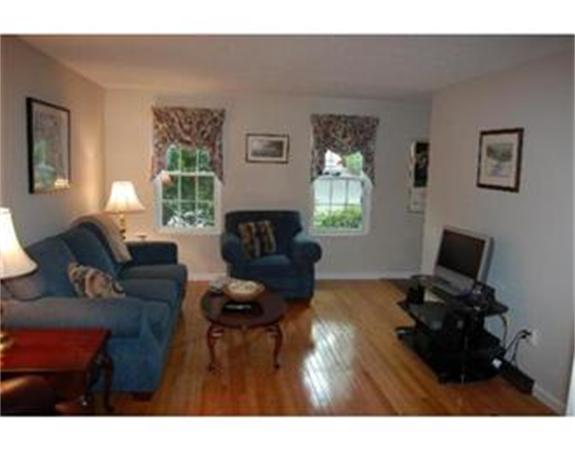12 Shaw Farm Road, Unit 12 Canton, MA 02021 - Photo 7 of 8 a living room with furniture and a fireplace