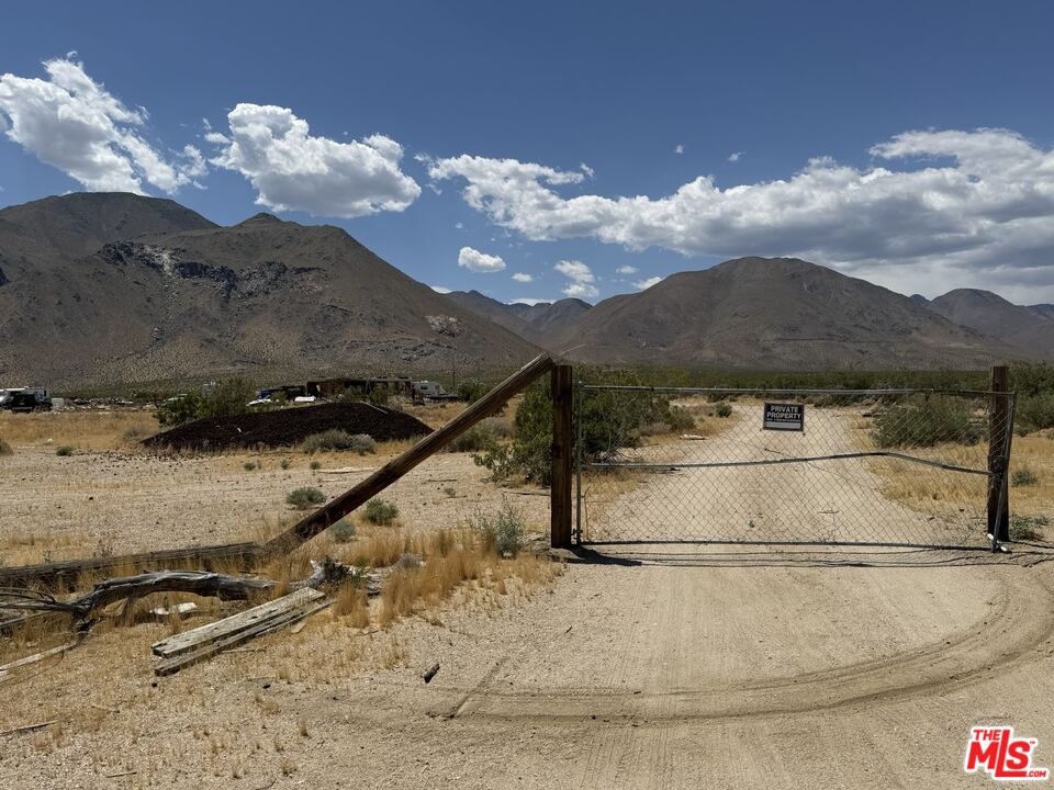 401 Sterling Road Inyokern, CA 93527 - Photo 17 of 37 a view of a house with a yard