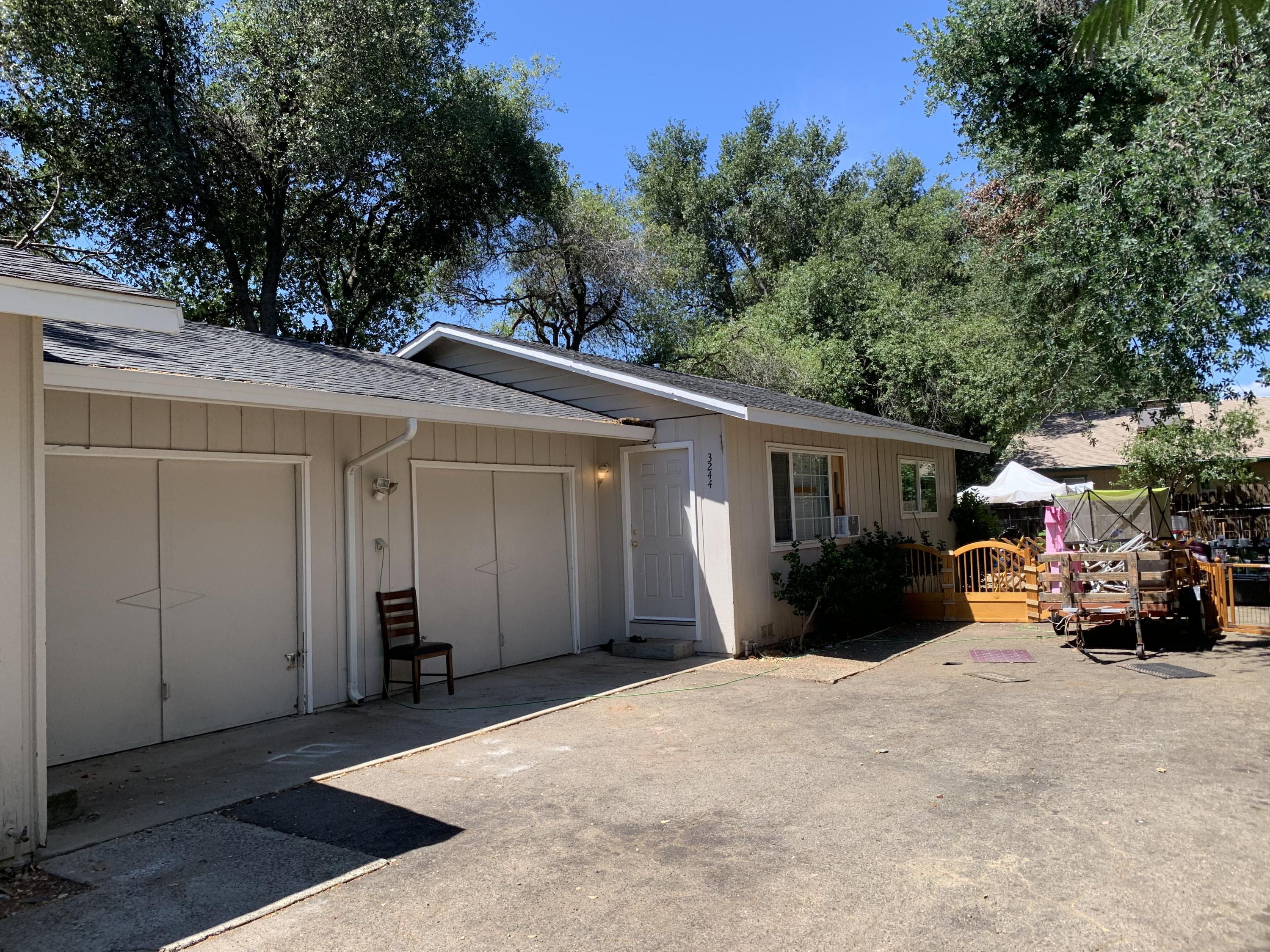 3242 Lawrence Road Redding, CA 96002 - Photo 2 of 17 a view of a house with a patio