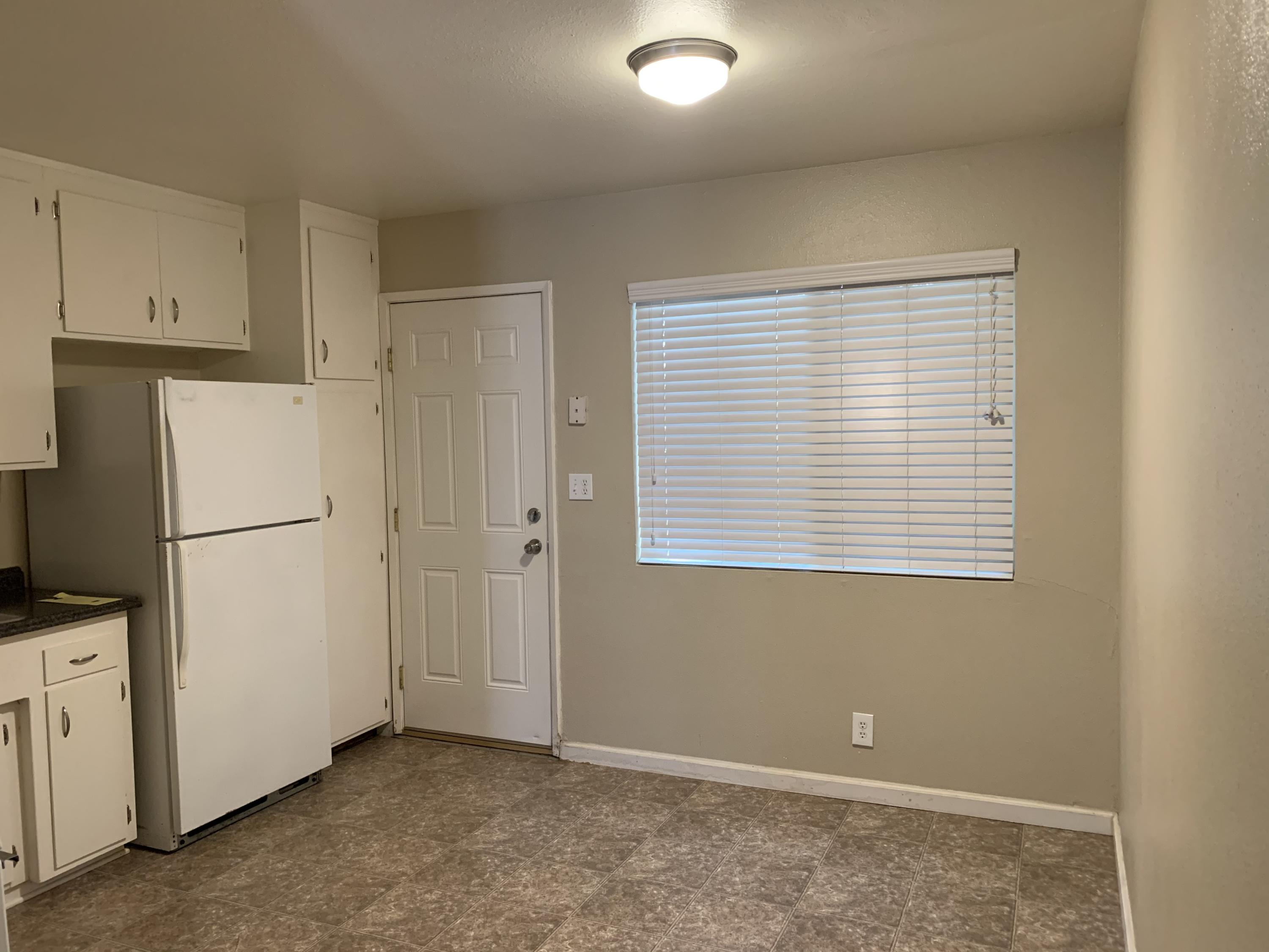 3242 Lawrence Road Redding, CA 96002 - Photo 4 of 17 a view of an empty room with a window