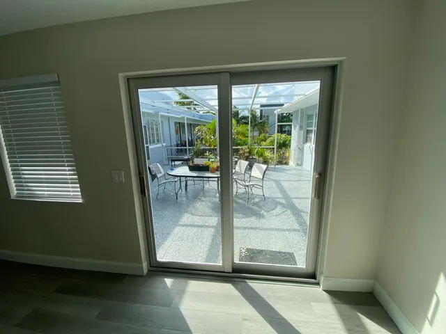 a view of a living room and window