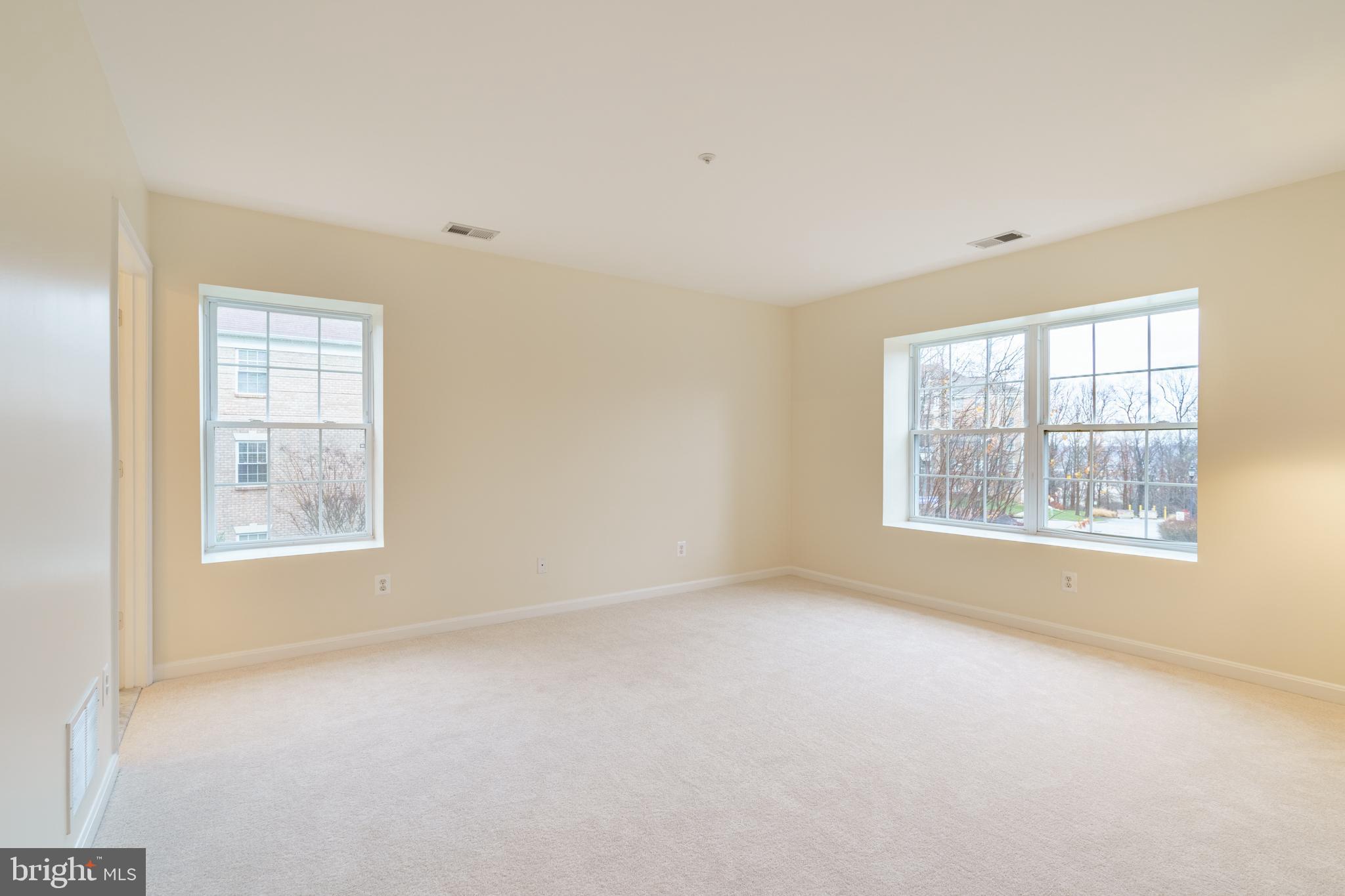 12350 Rosslare Ridge Road, Unit 204 Lutherville-Timonium, MD 21093 - Photo 10 of 19 Large bright primary bedroom