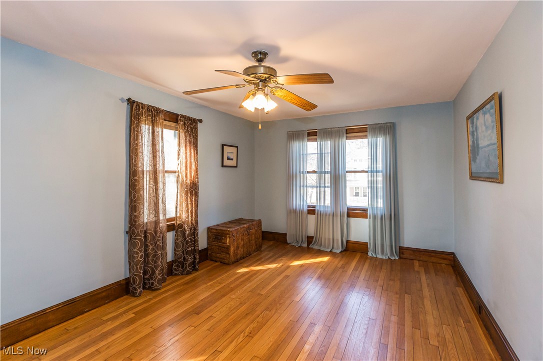 1577 Maple Road Cleveland Heights, OH 44121 - Photo 11 of 30 Larger bedroom with ceiling fan, and light wood finished floors