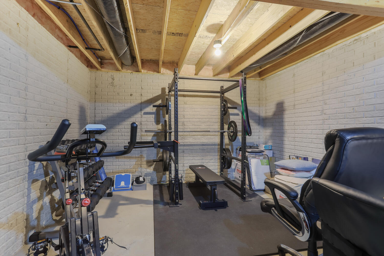 Undisclosed Address Savoy, IL 61874 - Photo 13 of 29 a view of gym equipment with windows