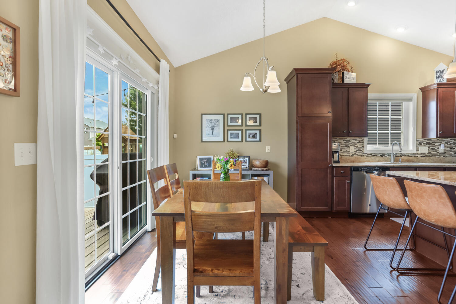 Undisclosed Address Savoy, IL 61874 - Photo 25 of 29 a view of a dining room with furniture window and wooden floor