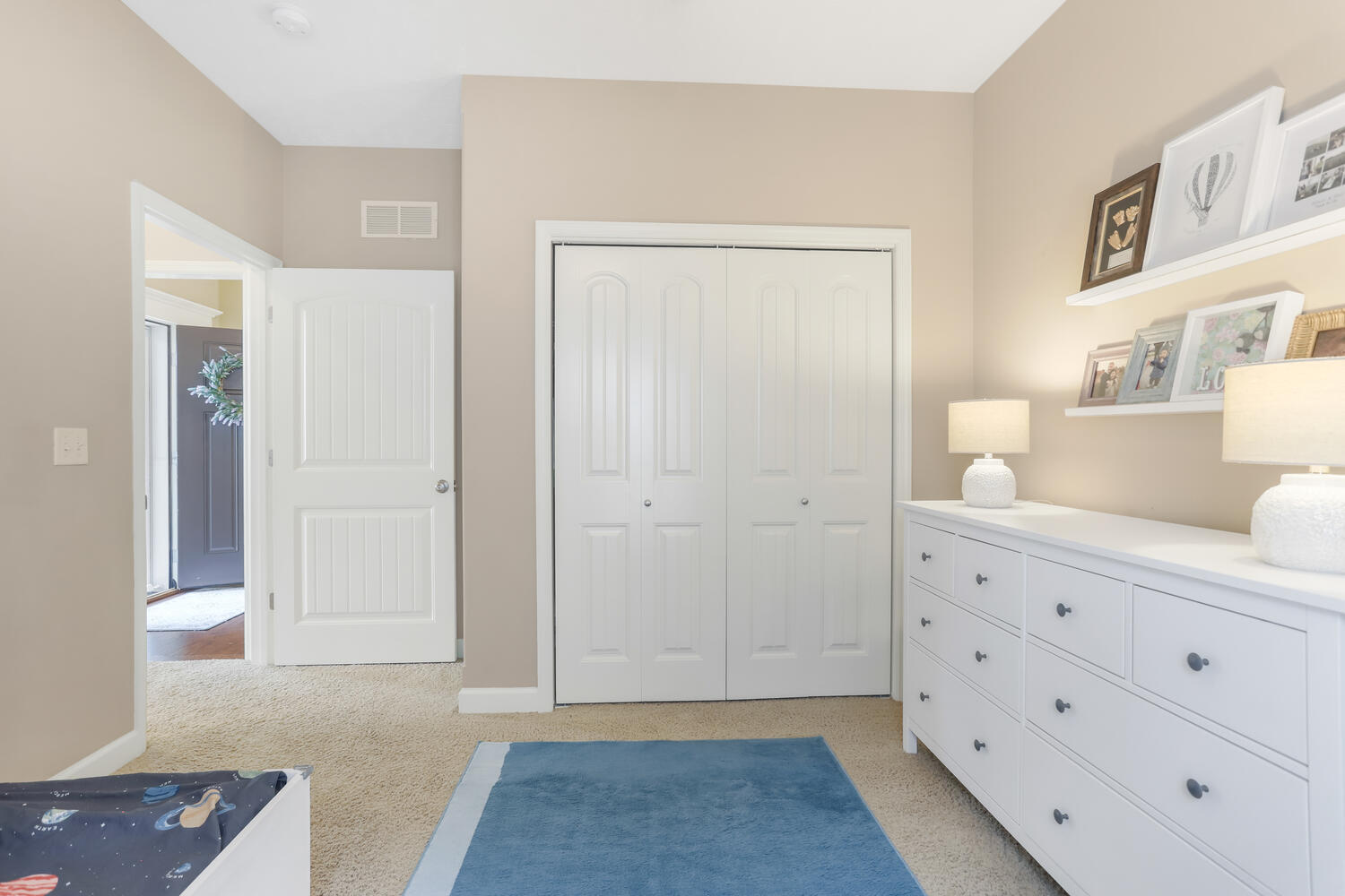 Undisclosed Address Savoy, IL 61874 - Photo 4 of 29 a view of room with cabinet and mirror