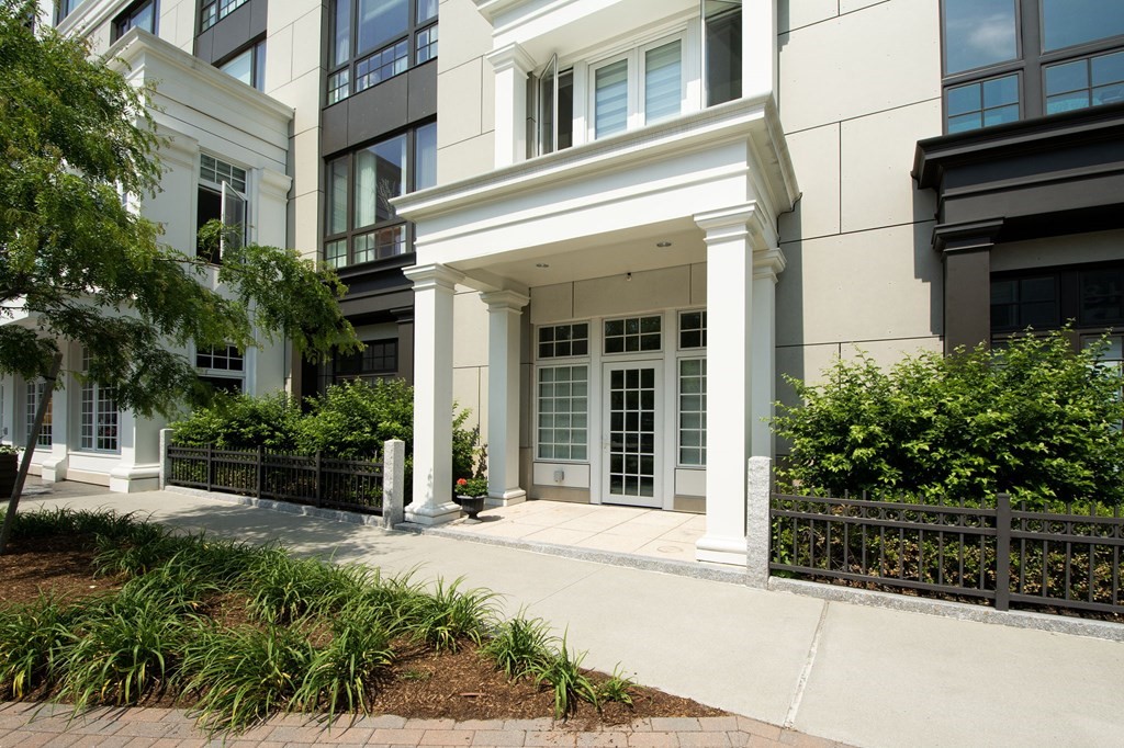 a view of a building with a window and garden