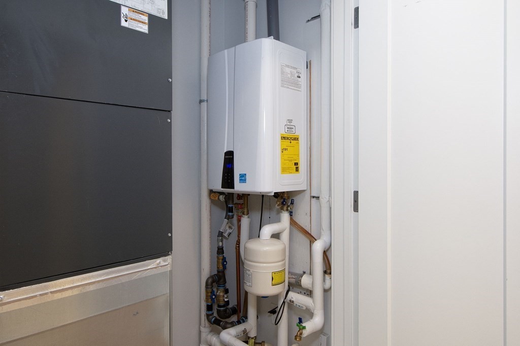 10 Shipyard Drive, Unit 102 Hingham, MA 02043 - Photo 21 of 31 a bathroom with a sink and toilet