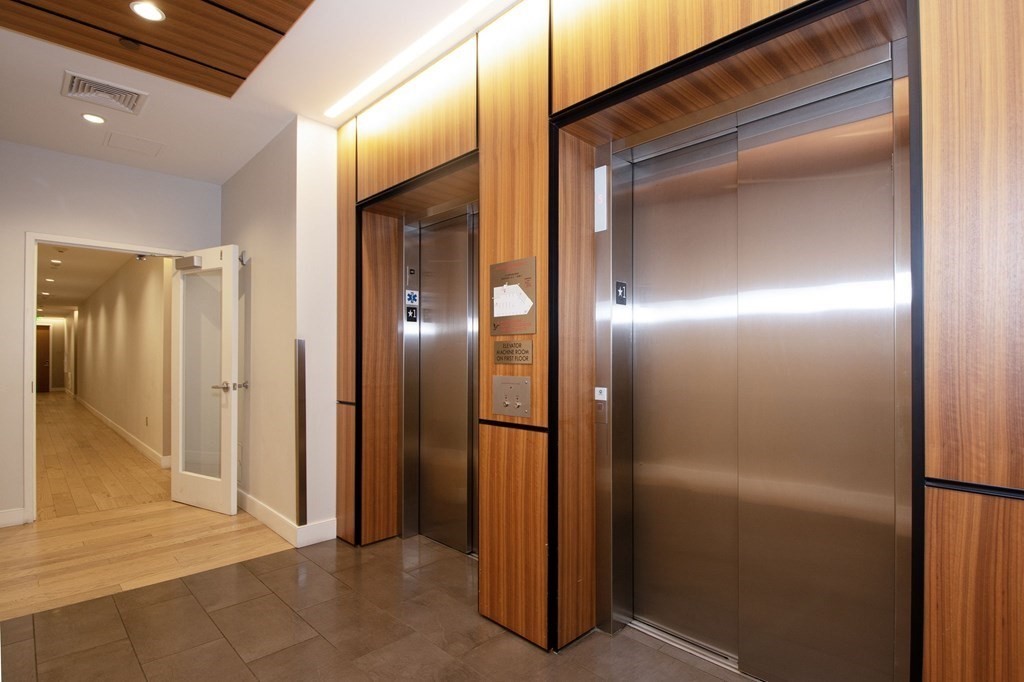 10 Shipyard Drive, Unit 102 Hingham, MA 02043 - Photo 27 of 31 a view of elevator with hallway