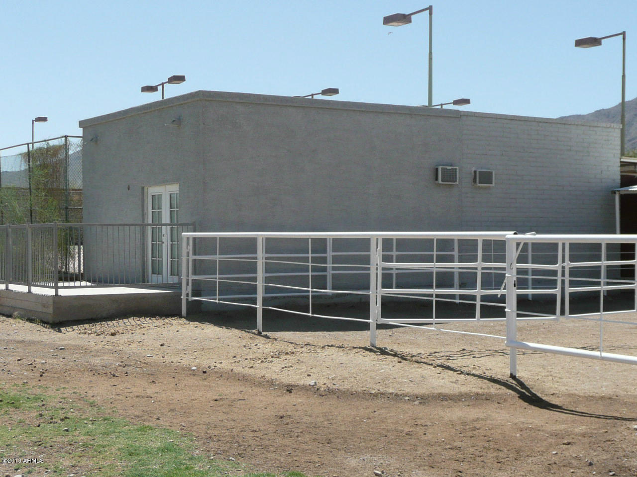 4128 West Elliot Road Laveen, AZ 85339 - Photo 101 of 114 a view of a house with a large window