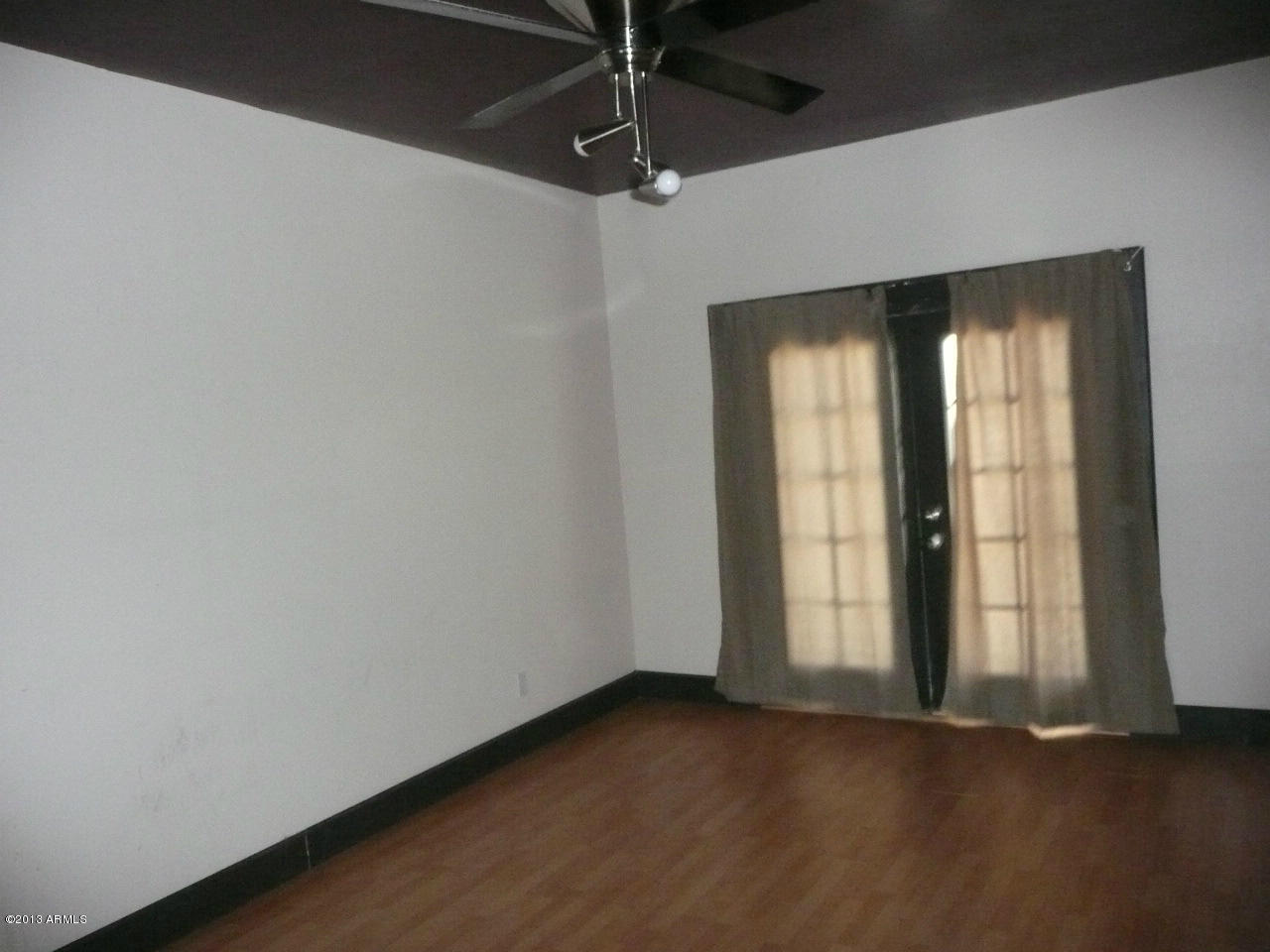 4128 West Elliot Road Laveen, AZ 85339 - Photo 105 of 114 a view of an empty room with a window